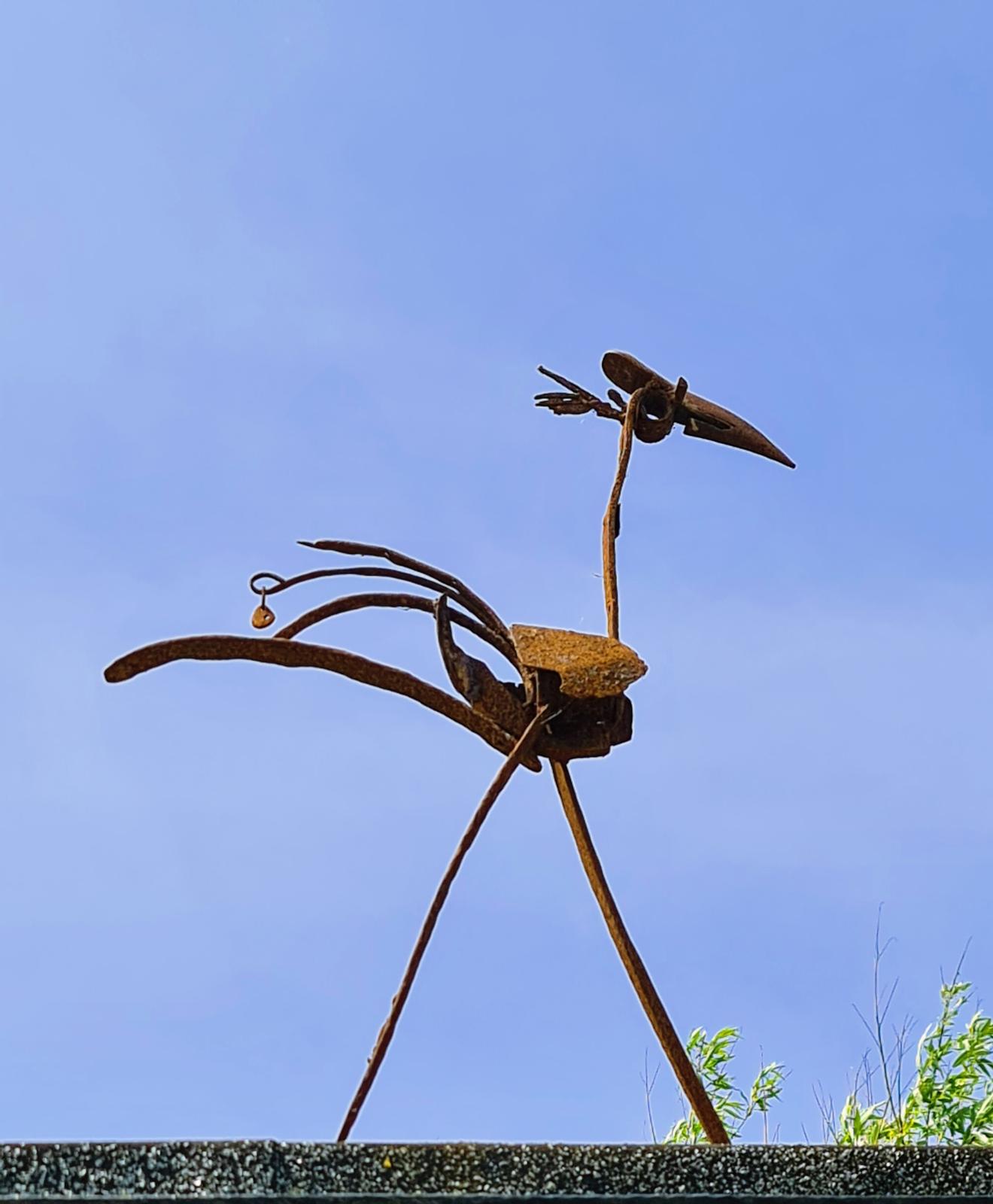 Spare Parts Bird by Greta Berlin, part of the Sculpture Trail in Langmoor Gardens, Lyme Regis