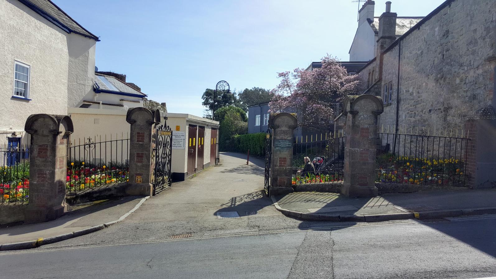 Gated entrance to Langmoor and Lister Gardens in Lyme Regis