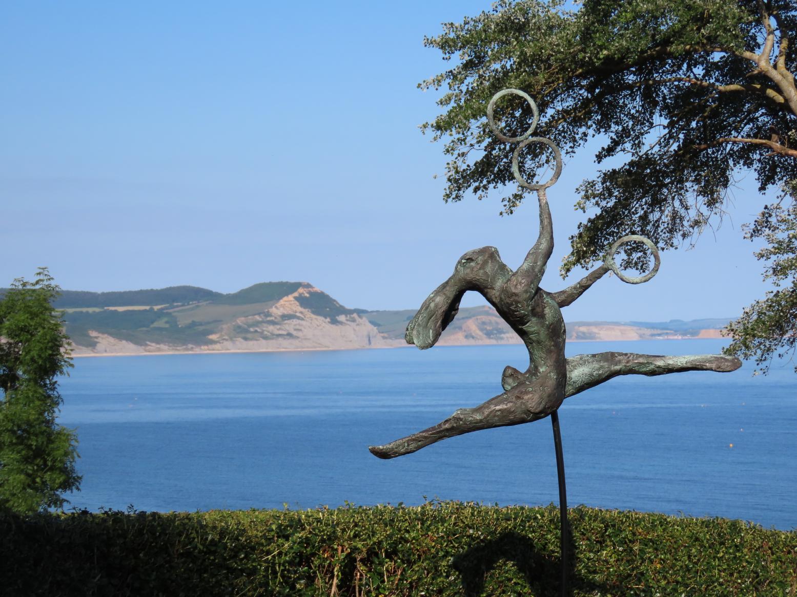 Juggler by Clare Trenchard, part of the Sculpture Trail in Langmoor Gardens, Lyme Regis