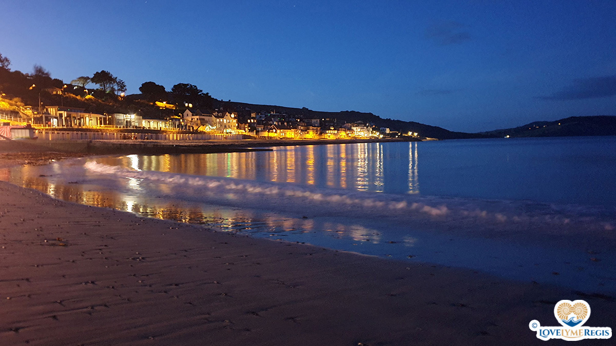 Night falls Lyme Regis beach