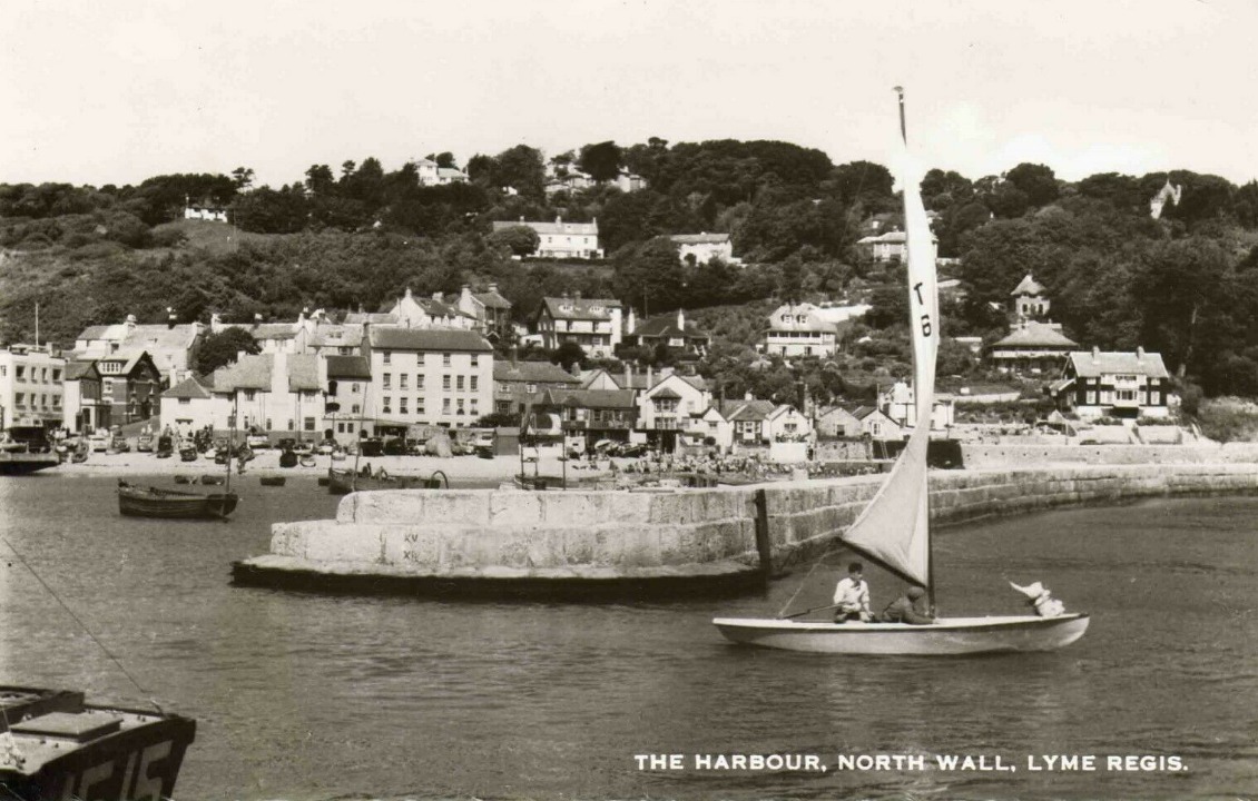 Vintage postcard of the North Wall, The Harbour, Lyme Regis circa 1960