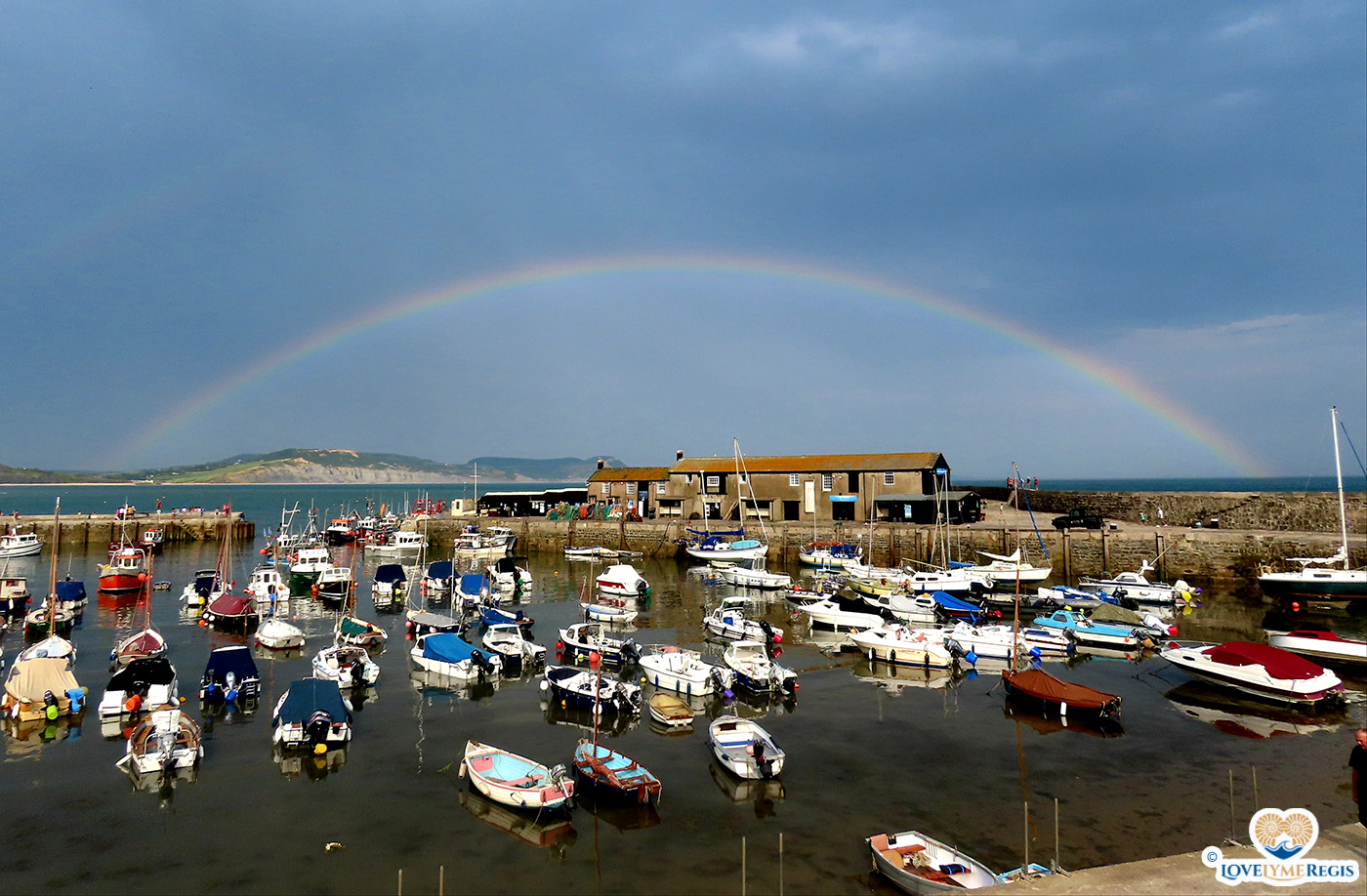 Rainbow over Lyme Regis harbour