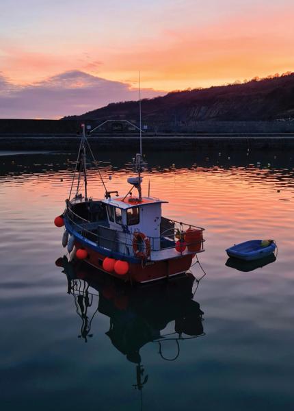 Fishing boat sunset