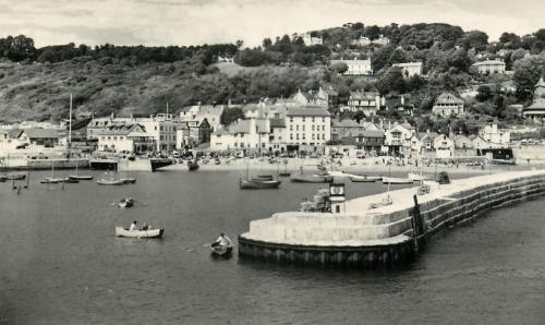 Lyme Regis harbour entrance, circa 1950s