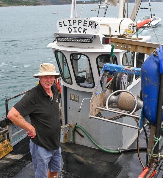 Lyme Regis fisherman Paul Wason on board Slippery Dick