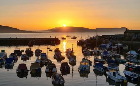 Sunrise Lyme Regis harbour